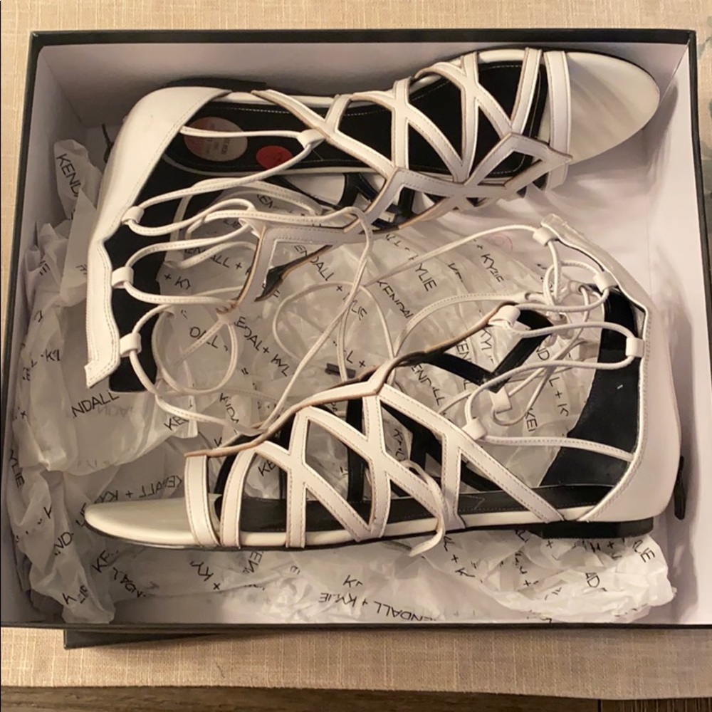 Kendall and Kylie white leather sandals.